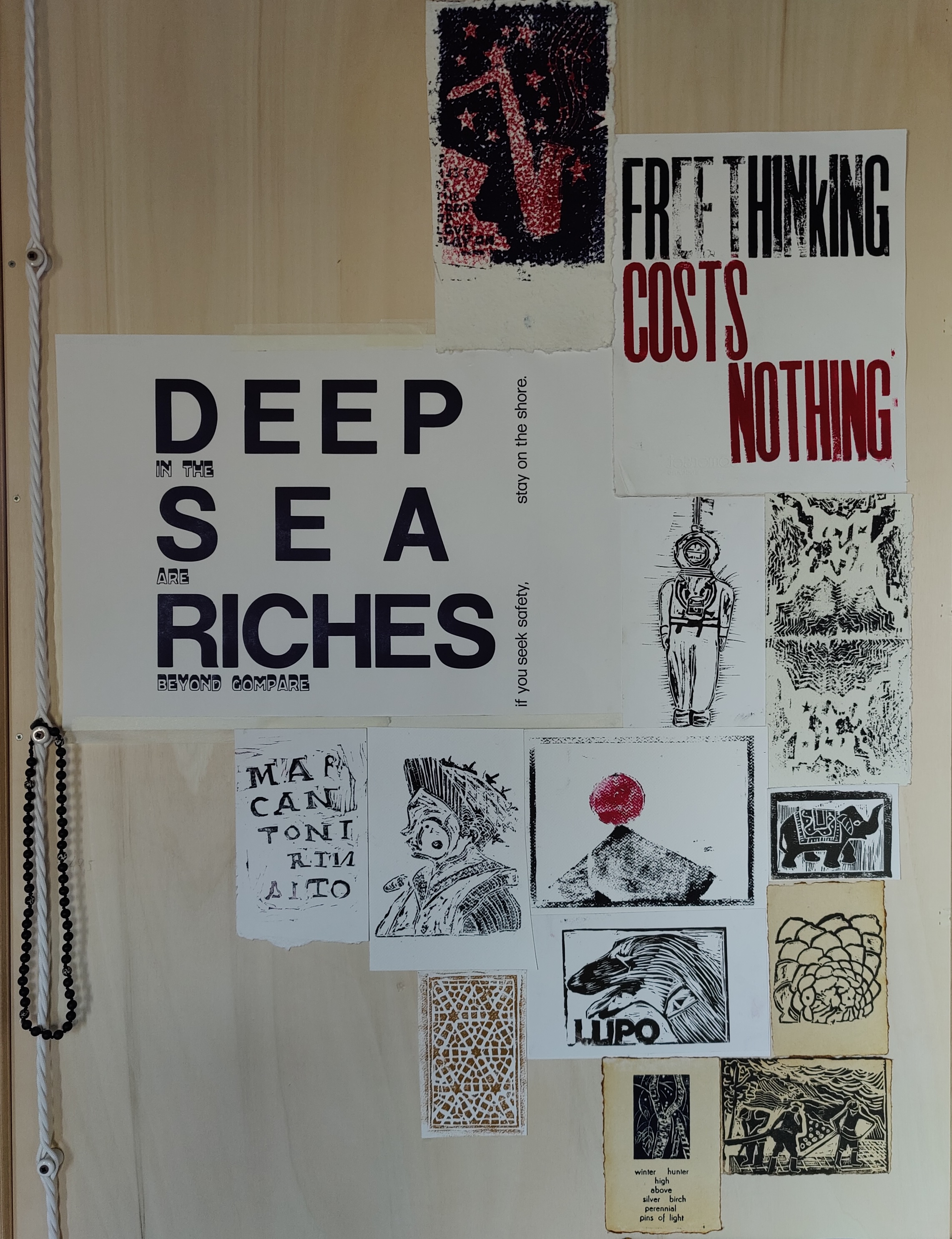 Prints and posters on the studio wall